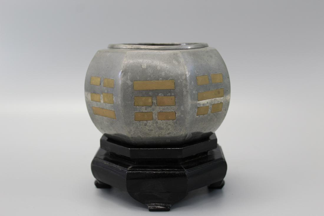 Chinese pewter Taoist incense burner: Chinese pewter Taoist incense burner. Diam 12 cm. H 9 cm. late 19th Century to early 20th Century.