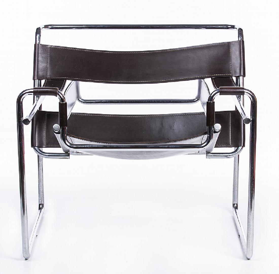 PAIR WASSILY MARCEL BREUER CROME LEATHER CHAIRS: Pair of Wassily Marcel Breuer chrome and brown leather armchairs. Measures approx. 31" l x 29" h x 27 1/2" d.