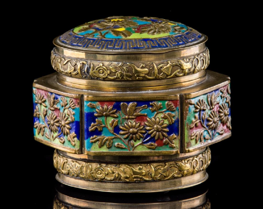 CHIENSE CLOISONNE COVERED GINGER JAR: Chinese cloisonne covered ginger jar with floral motif. Measures approx 3 1/2" h x 4 1/2" w.