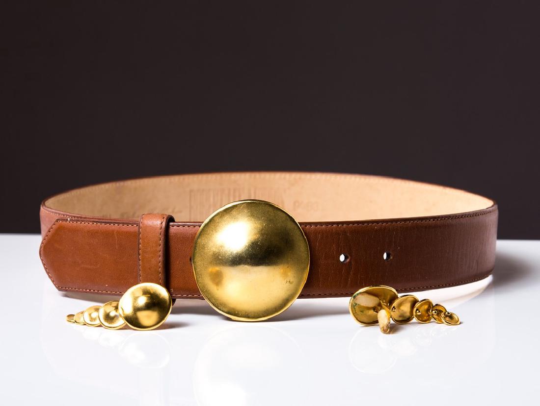 ROBERT LEE MORRIS BUCKLE BELT & EARRINGS SET: Robert Lee Morris light brown leather belt with signed jewelry type buckle plus matching cascading earrings.