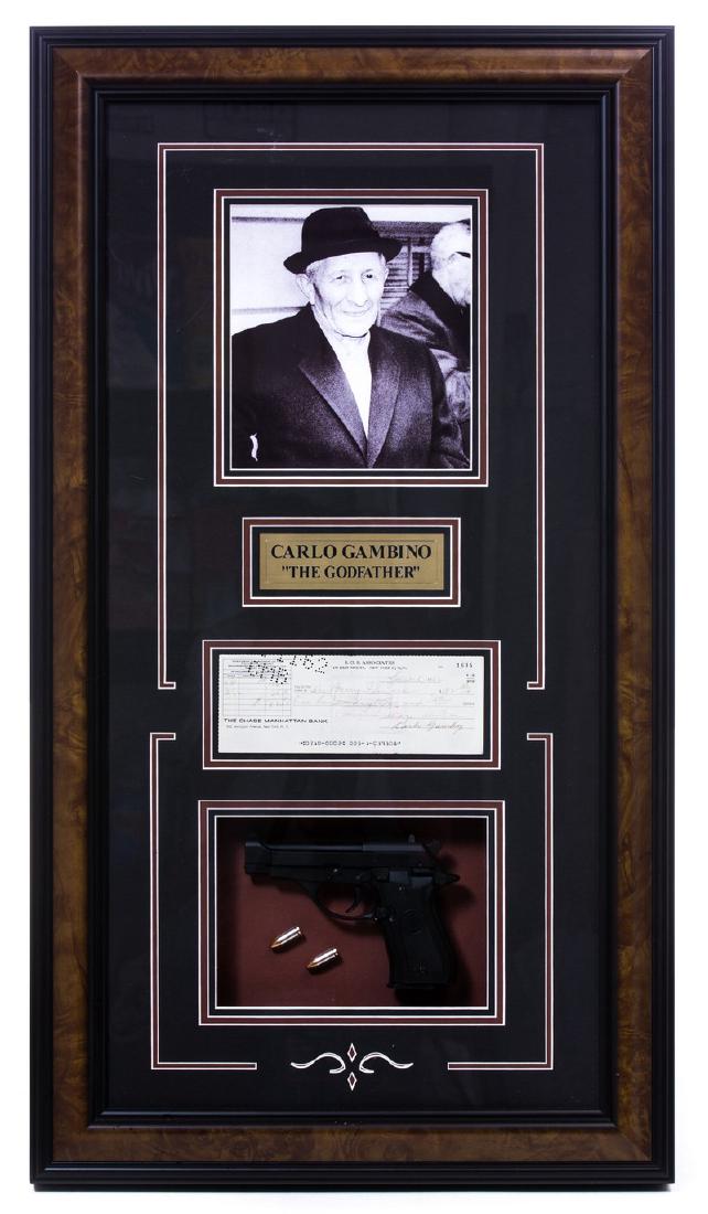 CARLO GAMBINO "THE GODFATHER" SIGNED CHECK: Carlo Gambino "The Godfather" signed check and autograph in shadow box. Measures approx 20 1/4" w x 36 1/4" h x 3 1/2" d.
