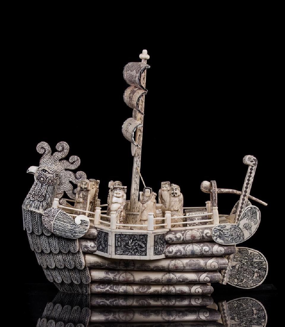 CHINESE CARVED FIGURAL BONE FISHING BOAT: Chinese carved figural bone fishing phoenix boat. Depicts 7 figures on board a sailing vessel. Measures approx 19 1/2" h x 18 1/2" L x 8 1/2" d.