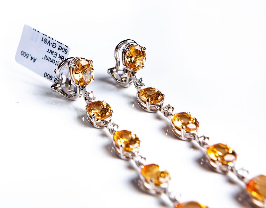 ANONINI WHITE GOLD DIAMOND AND CITRINE DANDY EARRI: Antonini 18 kt white gold and (5) citrine dangle earrings each with omega backs. 3" L. 11 dwt.
