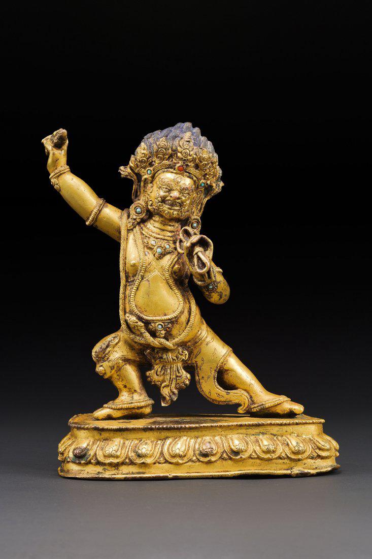 A heavily cast gilt bronze figure of Vajrapani (1 of 3)