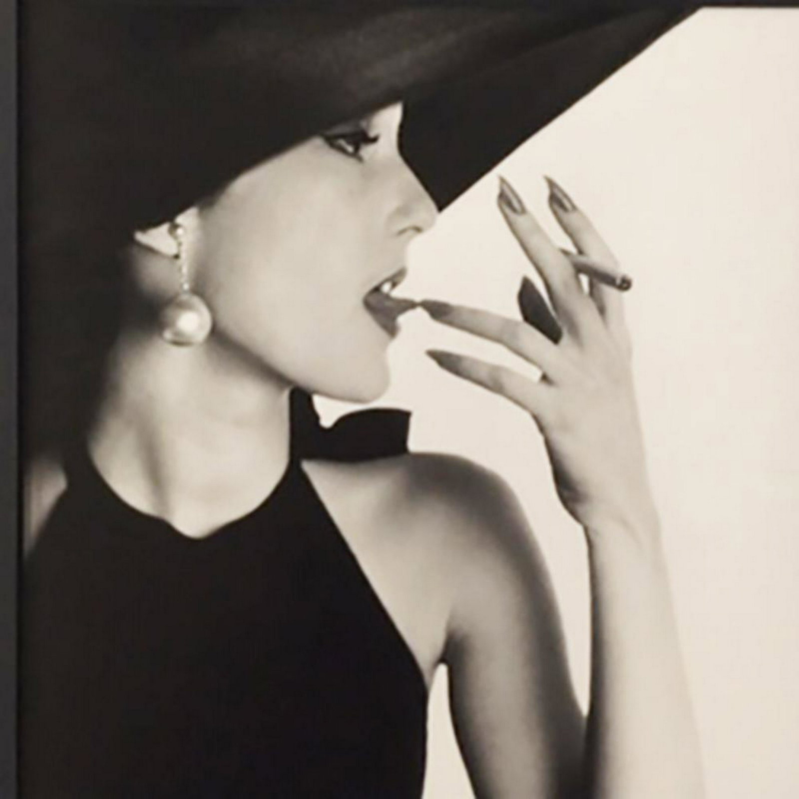 Irving Penn girl with tobacco on tongue New York 1951: Irving Penn girl with tobacco on tongue New York 1951 Photolithograph. 8x8 inch, 12x12 inch matted