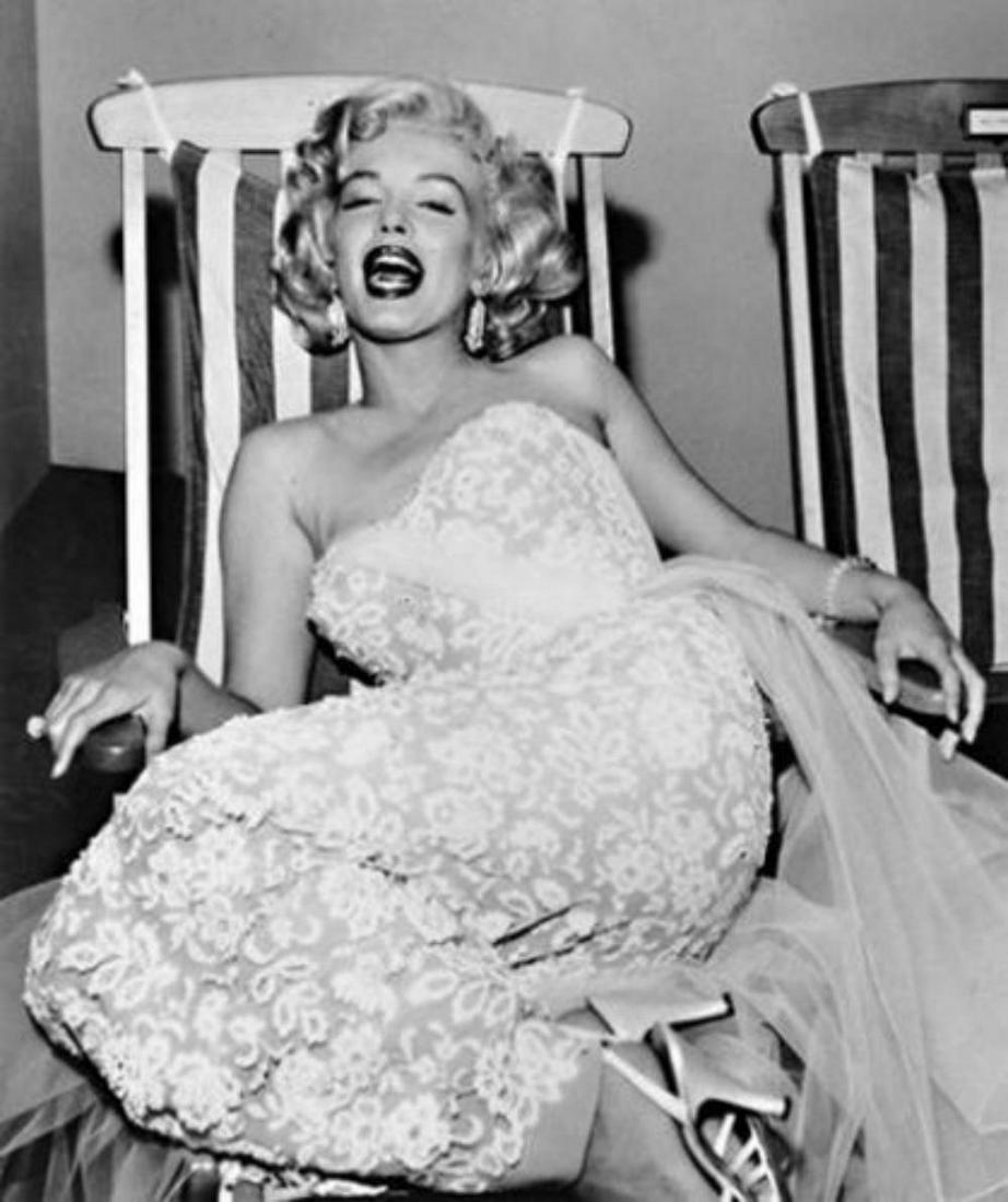 Frank Worth, (American, 1923-2000), "Marilyn Monroe: Frank Worth (American, 1923-2000) Marilyn Monroe Seated, Gelatin silver, printed later 13 x 18-3/4 inches (33 x 47.6 cm) Edition XX/195 in ink, with the photographer's estate stamp margin recto.