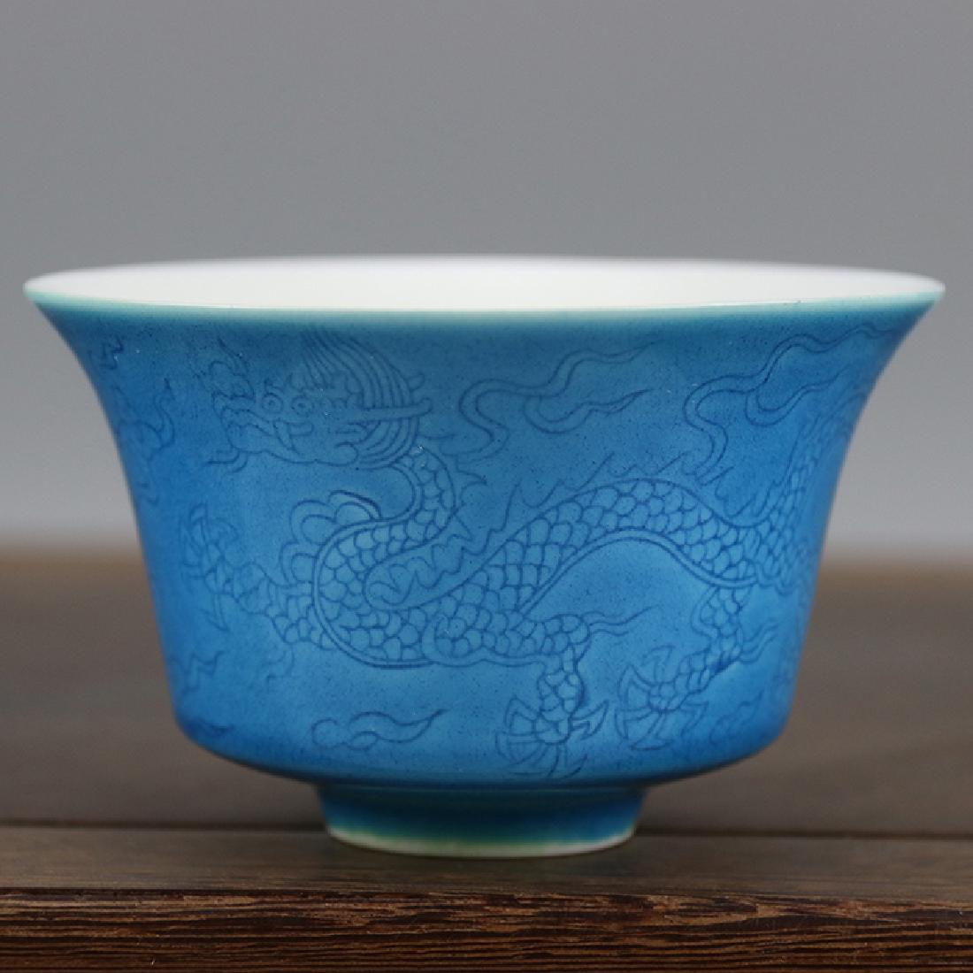 Chinese Ming Dynasty Chenghua Time Blue Ground: Chinese Ming Dynasty Chenghua Time Blue Ground Porcelain Cup With Dragon Decoration. Height: 60mm, Max Diameter: 97mm.