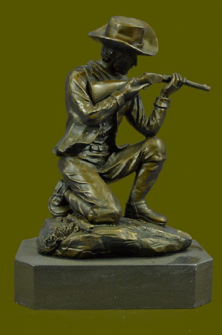 Western Cowboy Holding Gun Bronze Sculpture Statue Home: This sculpture is in perfect condition. Bronze Dimensions with Marble Base:Height 11" x Width 8" Marble Dimensions: 8" X 5" Height without base: 9" Weight : 12 LBS