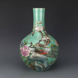 Qing dynasty green glaze bottle craving with flower