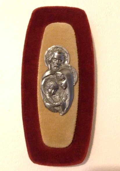 Vintage Holy Family Pewter on Velvet Wood Wall Plaque: 1970's vintage Religious wall plague depicting holy family in pewter mounted on wooden wall plaque lined with velvet. Back of tan fabric has some cushioning, brown fabric does not. Back is lined with