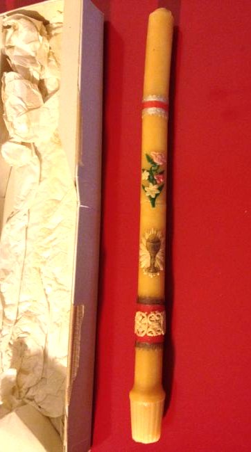 Rare 1931 Catholic First Communion Candle: A rare candle, a 1931 First Communion candle with beautiful design. As shown, there is a crack in the middle of candle and the wick was burned at the top with some wax melted on the back, otherwise in