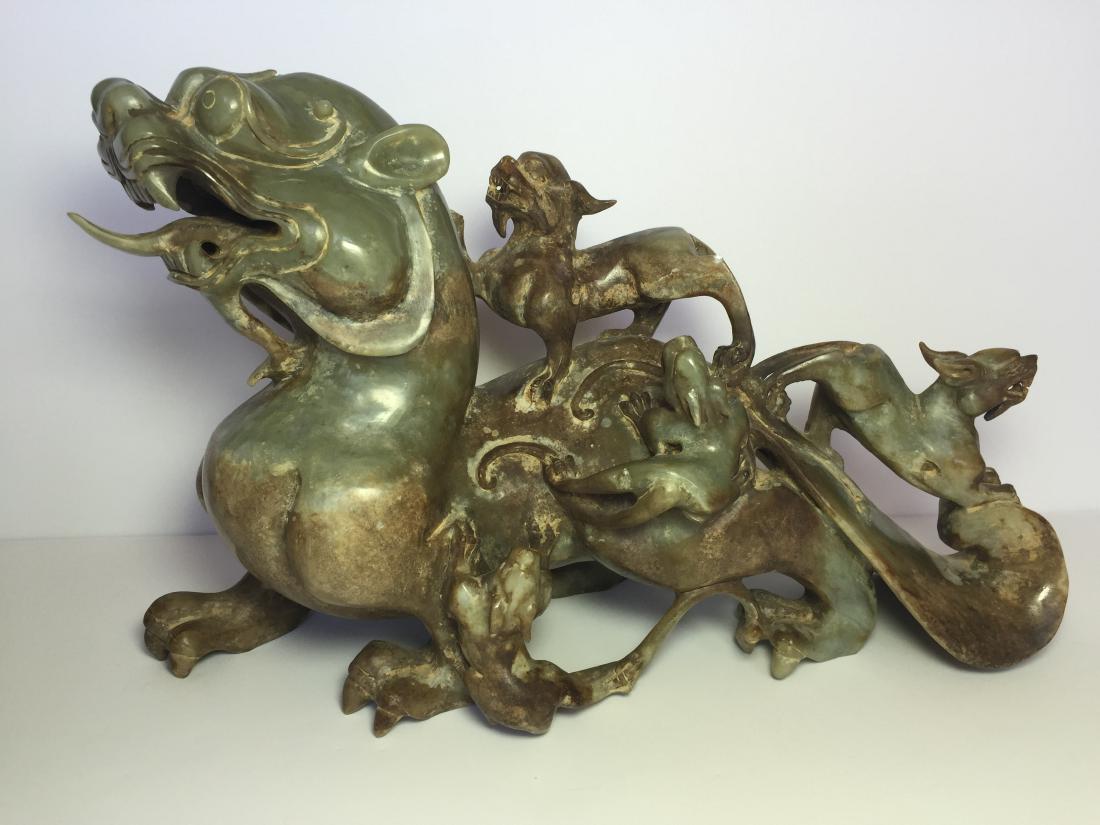 Archaic celadon jade carved group of dragons (1 of 10)