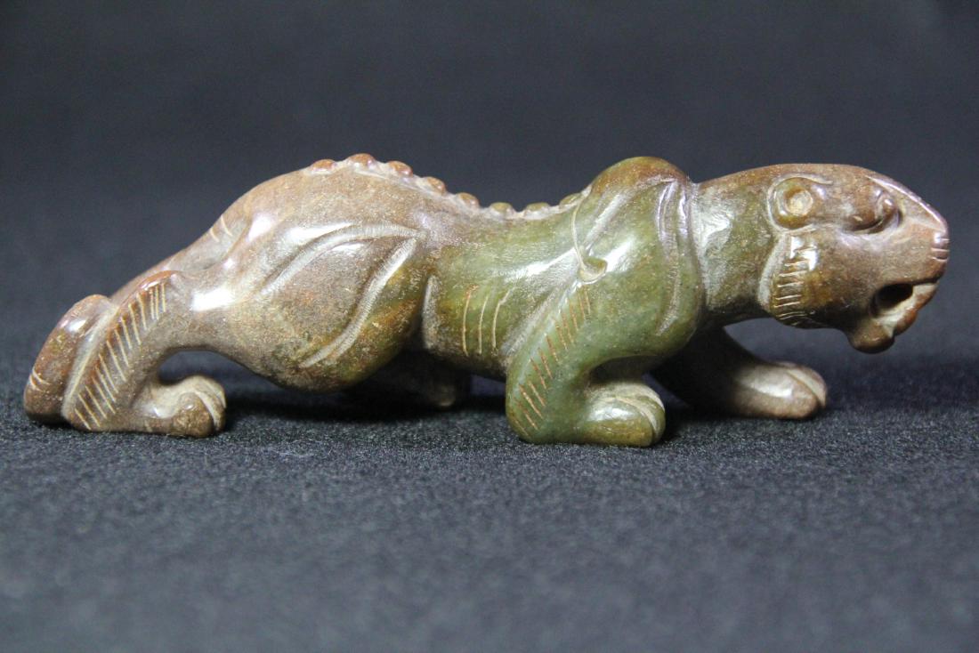 A celadon jade tiger carving (1 of 10)