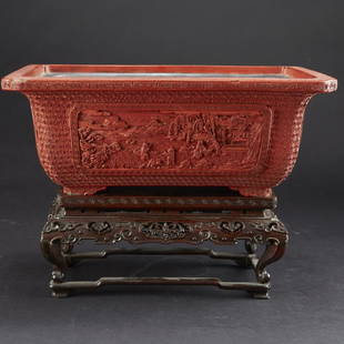 Early 19th century Chinese Cinnabar Lacquer Planter on: Early 19th century Chinese Cinnabar Lacquer planter with each side decorated with a reserve depicting a garden scene surrounded by elaborate diapering. Well carved and retains its original hardwood st