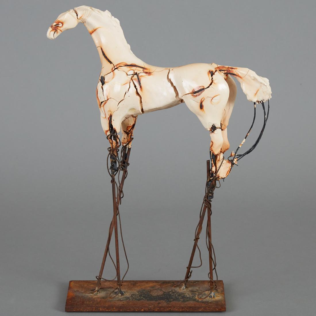 Carl Dahl Bronze and Porcelain Horse Sculpture: Carl Dahl (20th/21st c.). Bronze and porcelain horse sculpture. Signed under the base. Dimensions: Height: 18 1/4 in x width: 4 in x depth: 10 in.
