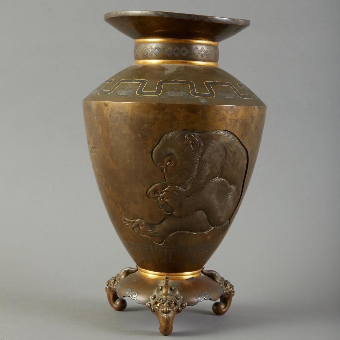Meiji Yokoyama Japanese Bronze Vase Inlaid Gold /: A stunning and very large Japanese mixed metal vase decorated with a carved monkey on the front, his eyes inlaid with gold and an amazing branch with golden peaches on the back. The bottom bears the i