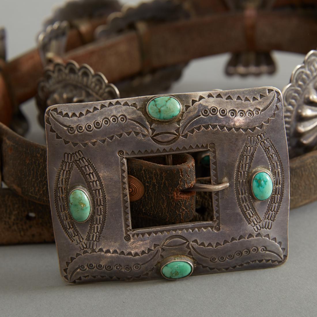 Concho Belt Pat Read c. 1935: Concho belt. Seven conchos and six butterflies inlaid with turquoise stones. Circa 1935. Tag from Pat Read Indian Trader. Dimensions: Belt length: 47 3/4 in.
