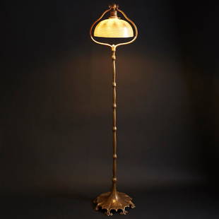 Tiffany Studios Bell Floor Lamp with Favrile Shad: Tiffany Studios Bell floor lamp with favrile shade and bronze base, c. 1910. Shade is signed "L.C.T." and inscribed "Favrile." Marked "Tiffany Studios New York" and "425" under the base. Provenance: P