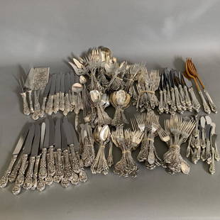 Large Set of Wallace Sterling Silver Grand Baroqu: Large set of Wallace sterling silver flatware in the Grand Baroque pattern. Comprised of 36 spreader knives, fourteen dinner knives, eighteen rounded dinner knives, one salad serving fork and spoon