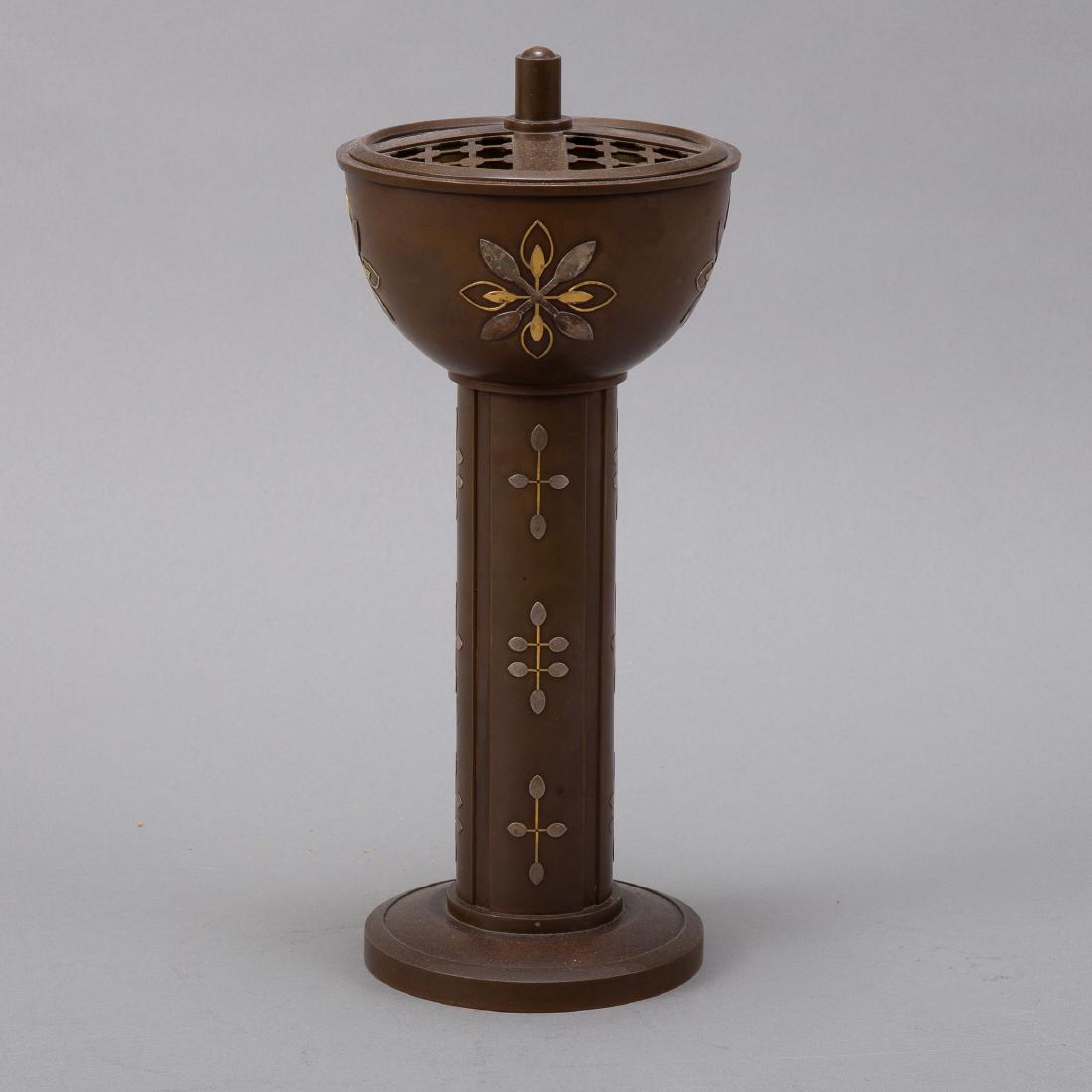 Japanese Meiji Mixed-metal Censer Kotaro Saku: A striking Japanese Meiji era mixed metal censer decorated with applied silver and copper. Signed on bottom Kotaro (Kotarou) Saku Tsukuta. Dimensions: Height: 11 in x diameter: 5 3/4 in. SKU: 00941
