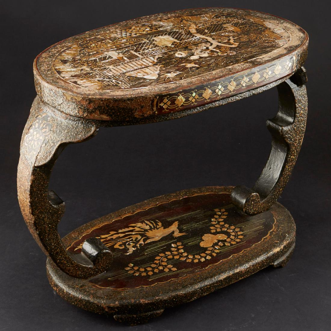 Japanese Lacquer and Mother of Pearl Stool: Japanese lacquered stool, inlaid with mother-of-pearl. Dimensions: Height: 13 in x length: 18 1/2 in x width: 9 1/4 in. SKU: 01003