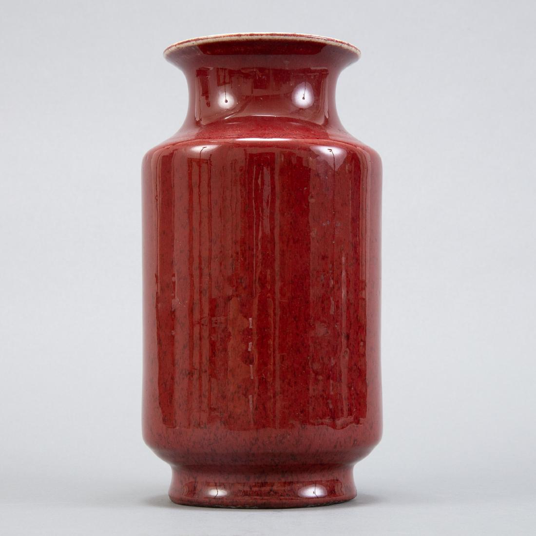 Chinese Oxblood Vase w/ 6 Character Mark: Chinese oxblood or sang de boeuf porcelain cylinder form vase with a 6 character Kangxi mark on the underside. Provenance: Antiques Riverwalk, Minneapolis, Minnesota, 2002; Private collection, Minneso