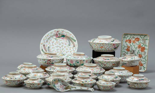 Chinese Guangxu Period Porcelain Dinner Set: A Guangxu period Chinese dinner set. Lot includes four dinner plates, one serving tray, one serving spoon, and twenty bowls with matching lids. Bowls come in five different sizes. Many pieces bear and