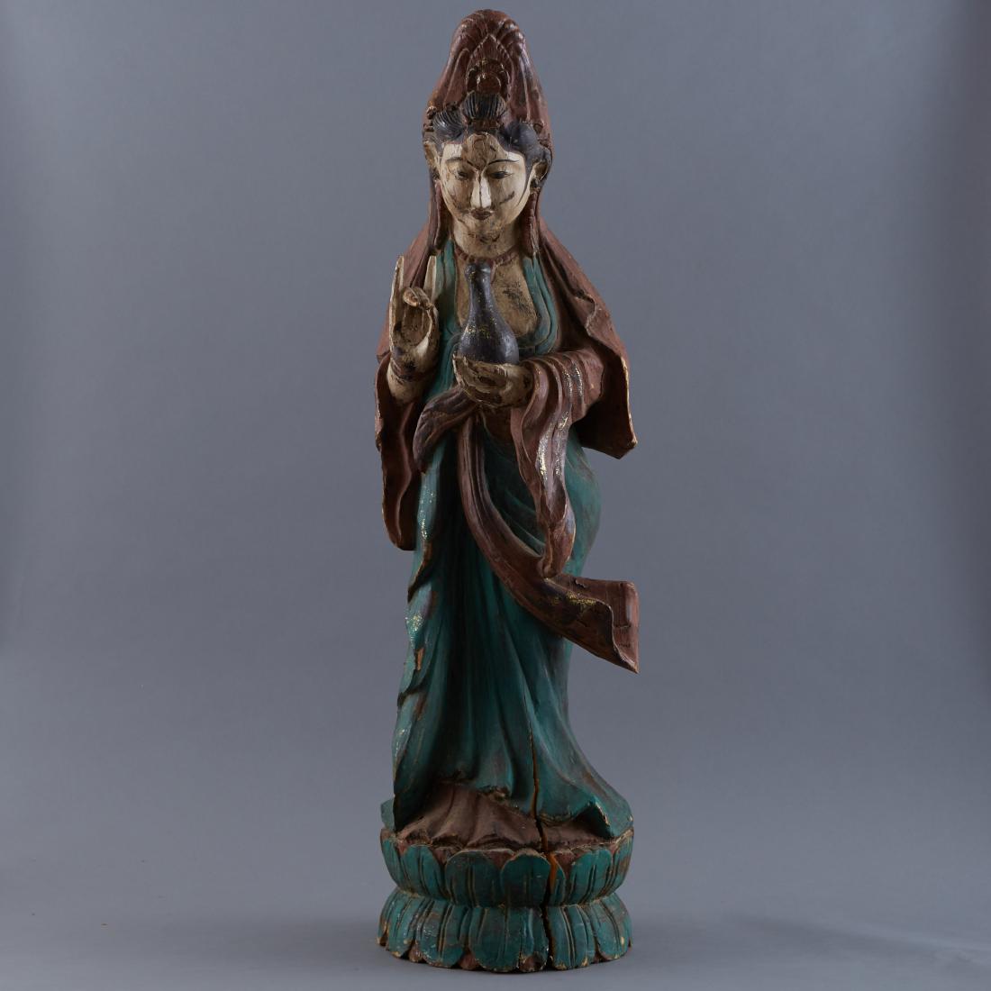 19th c. Large Wood Chinese Guanyin: 19th c. Chinese Buddhist wooden Guanyin statue. Large scale and with excellent polychrome decoration. Excellent large scale carving. Dimensions: Height: 40 in x width: 12 ft x depth: 10 in.