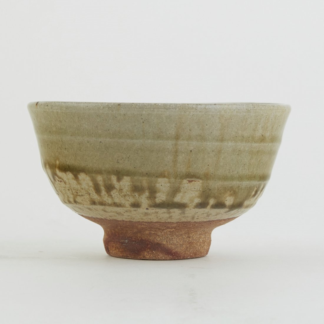 Warren MacKenzie Studio Pottery Bowl Olive Drip G: Warren MacKenzie (1924-2018). Studio pottery ceramic bowl with olive drip glaze and an unglazed underside. Marked above the footrim. Warren MacKenzie was a renowned Minnesota studio potter. A student