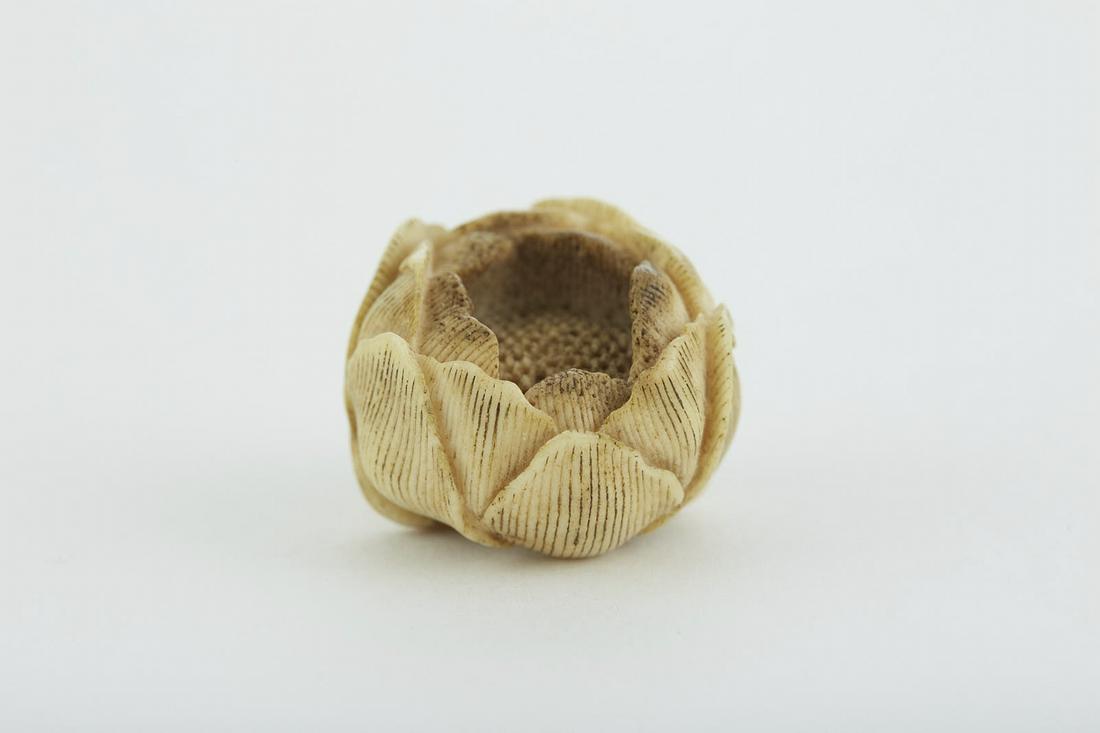 Japanese Meiji Stag Antler Netsuke of a flower -: One Japanese Meiji period carved stag antler netsuke in the form of a flower. Signed. Dimensions: Height: 1 in x width: 1 3/4 in x depth: 1 1/2 in. SKU: 02385