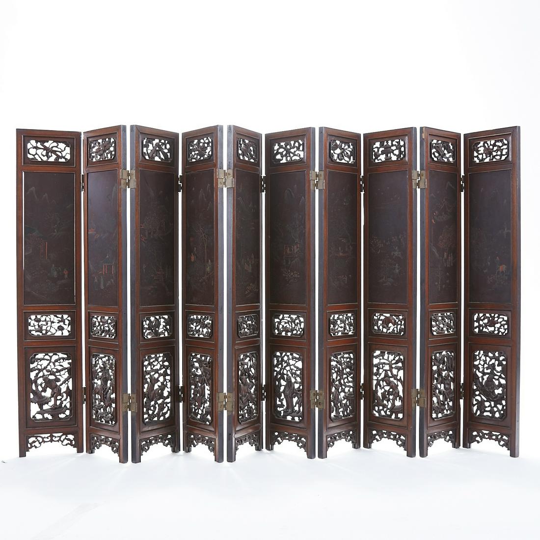 Chinese Early 20th c. Wood and Lacquer Folding Fl: Early 20th c. Chinese folding wooden floor screen. A small but well made screen, this one is well carved with lacquer decorated inserts. Comprised of ten panels. Dimensions: Each panel measures; Heigh