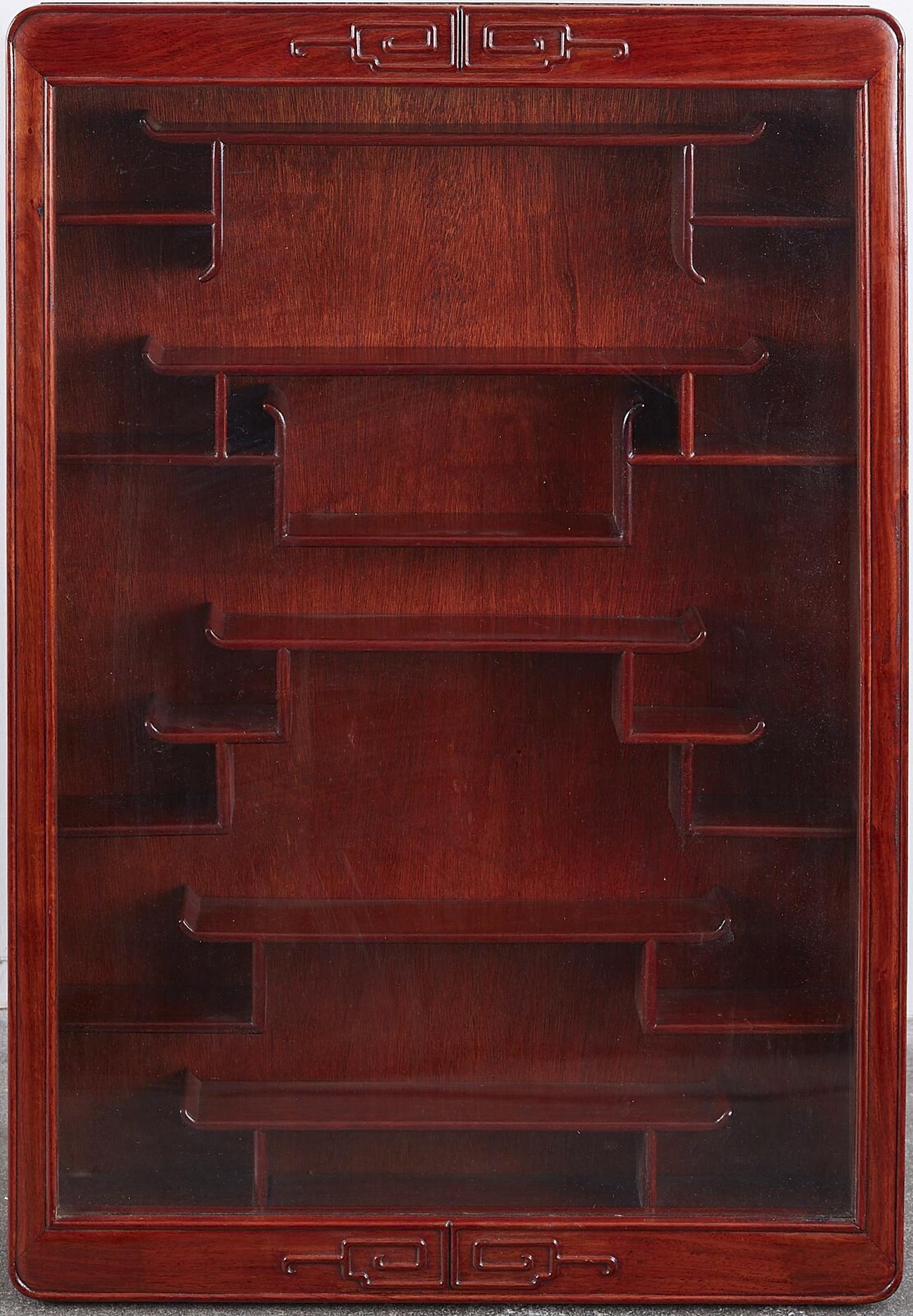 Chinese Wooden Wall Mounted Display Case: Chinese wall mounted wooden display case. An excellent case for small art objects such as netsuke, snuff bottles, Chinese porcelain bird feeders, or miniatures of any kind. Dimensions: Height: 34 1/2 