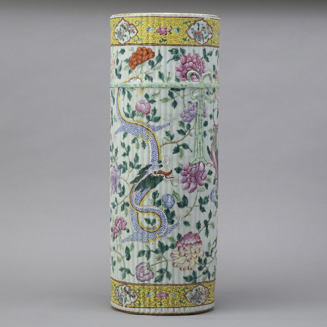 Chinese Qing Famille Rose Porcelain Umbrella Sta: 19th century Chinese porcelain umbrella stand with molded decoration made to look like a bundle of bamboo tied with silk. Dimensions: Height: 24 1/2 in x diameter: 9 1/4 in. SKU: 01134