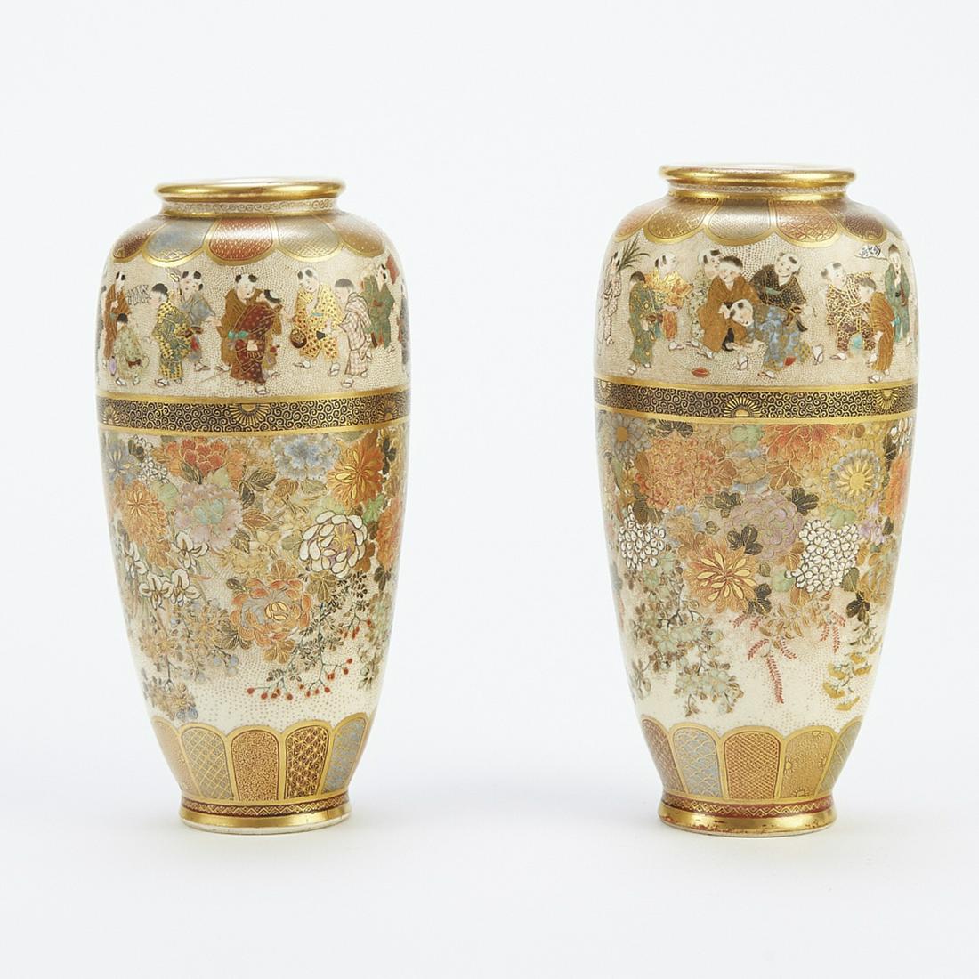 Pair Japanese Meiji Satsuma Vases Shizan: Beautiful pair of Japanese satsuma vases from the Meiji period. Each vase features wonderful floral decorations and scenes of children playing. Each marked with Shizan seal along the base. Dimensions: