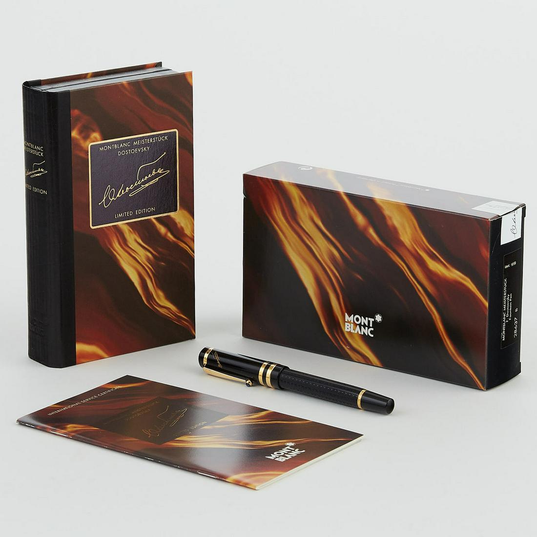 Montblanc Meisterstuck Fyodor Dostoyevsky Fountai: Montblanc Meisterstuck Writers Edition Fyodor Dostoyevsky limited edition fountain pen. Black precious resin barrel and cap with vermeil mountings and clip. Broad 18 K gold nib. Outer box, display box