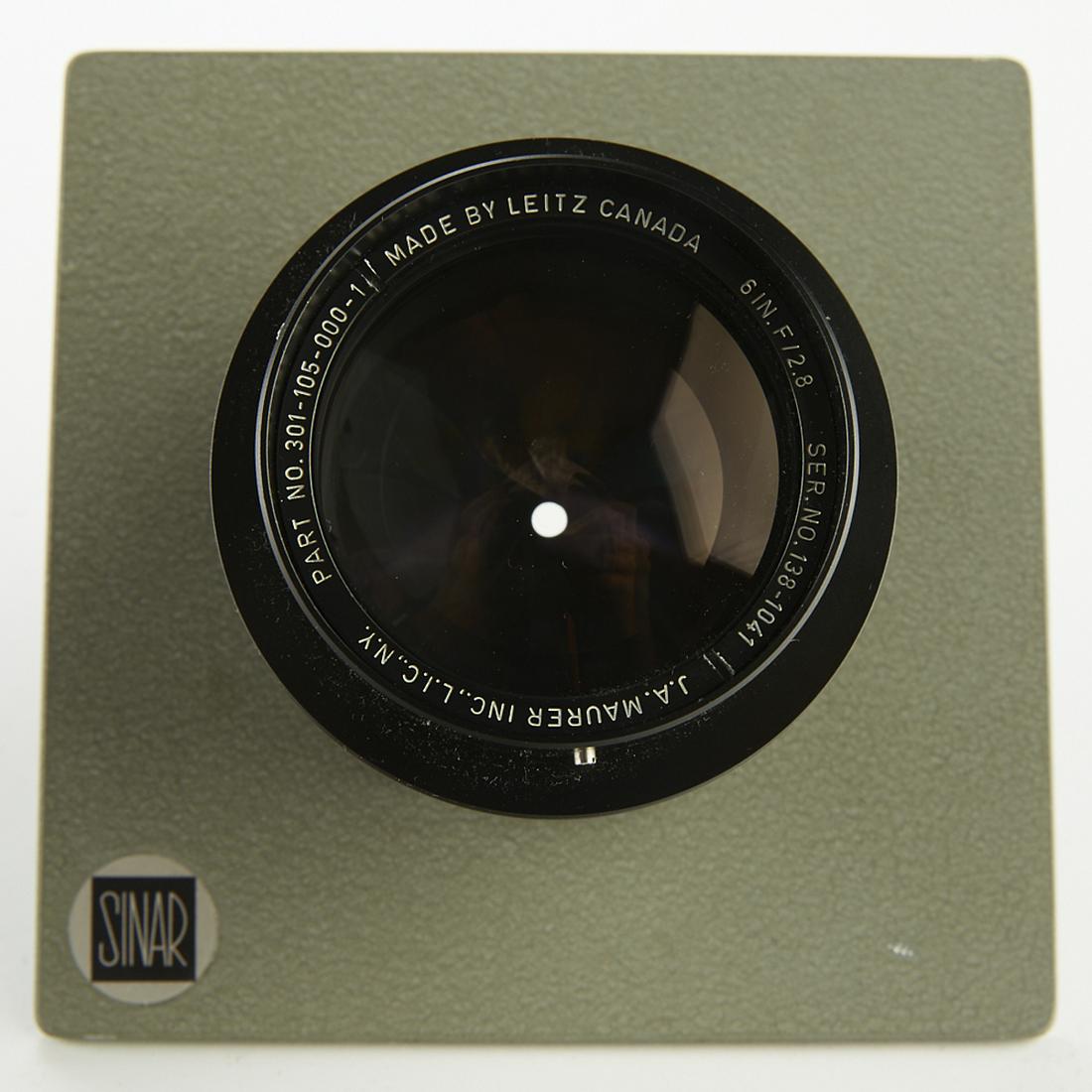 Leitz Canada 6 in. f-2.8 J.A. Maurere Inc. L.I.C.: Leitz Canada 6 in. f-2.8 J.A. Maurere Inc. L.I.C. N.Y. camera lens. Part No. 301-104-000-1. Serial number: 138-1041. Along with a Sinar lens board. Elcan Leitz. SKU: 03329