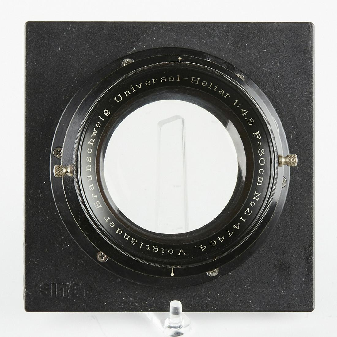 Voigtlander Braunschweig Universal Heliar 1:4.5 f: Voigtlander Braunschweig Universal Heliar 1:4.5 f=30cm f large format camera lens, on Sinar lens board. Serial number 2147464. SKU: 03759