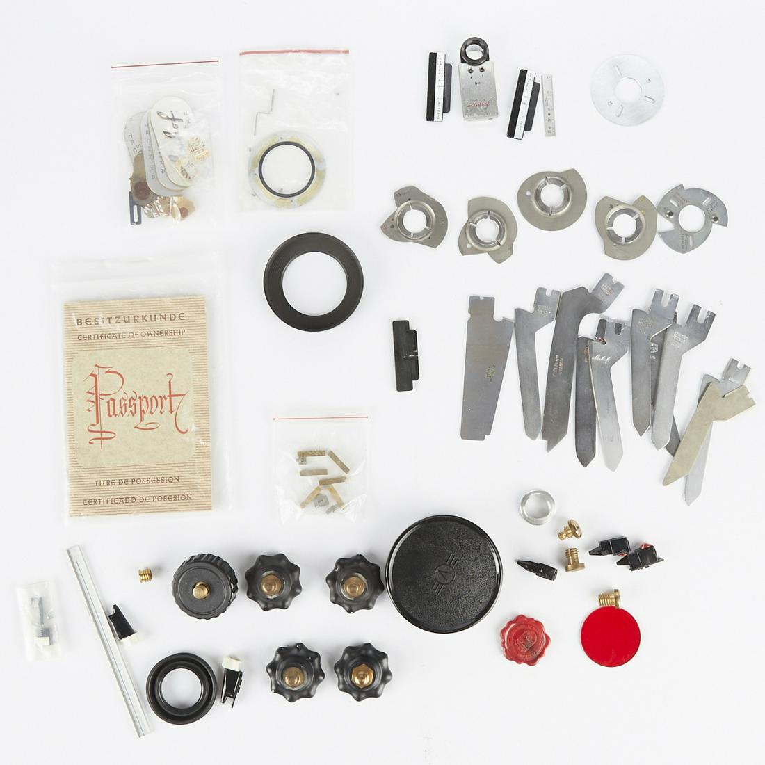 Large Group of Linhof Accessories and Parts: A variety of Linhof accessories and parts including Linhof brand/name plates, monorail mount, hand screws, shutter trigger mounts, Technika rail stops, and other sundry components. SKU: 04089
