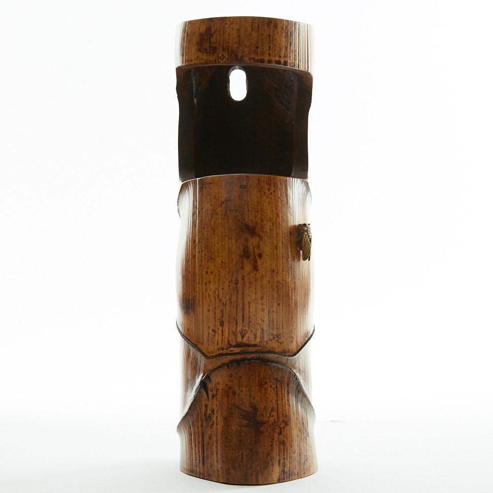 Japanese Meiji Bamboo Vase for Ikebana: Japanese Meiji period carved bamboo vase for ikebana. With a delicately carved cicada along the side. Designed to hang on the wall.Height: 9 in x width: 3 1/4 in x depth: 2 3/4 in.