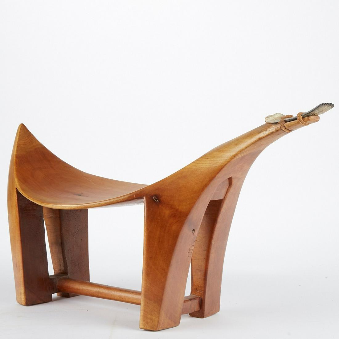 Early 20th c. Nukuoro Coconut Grating Stool: Early 20th century Nukuoro coconut grating stool Nukuoro Atoll Caroline Islands Micronesia. In zoomorphic form with a shell blade attached with fiber cord. Refinished at some point. Evidence of drying