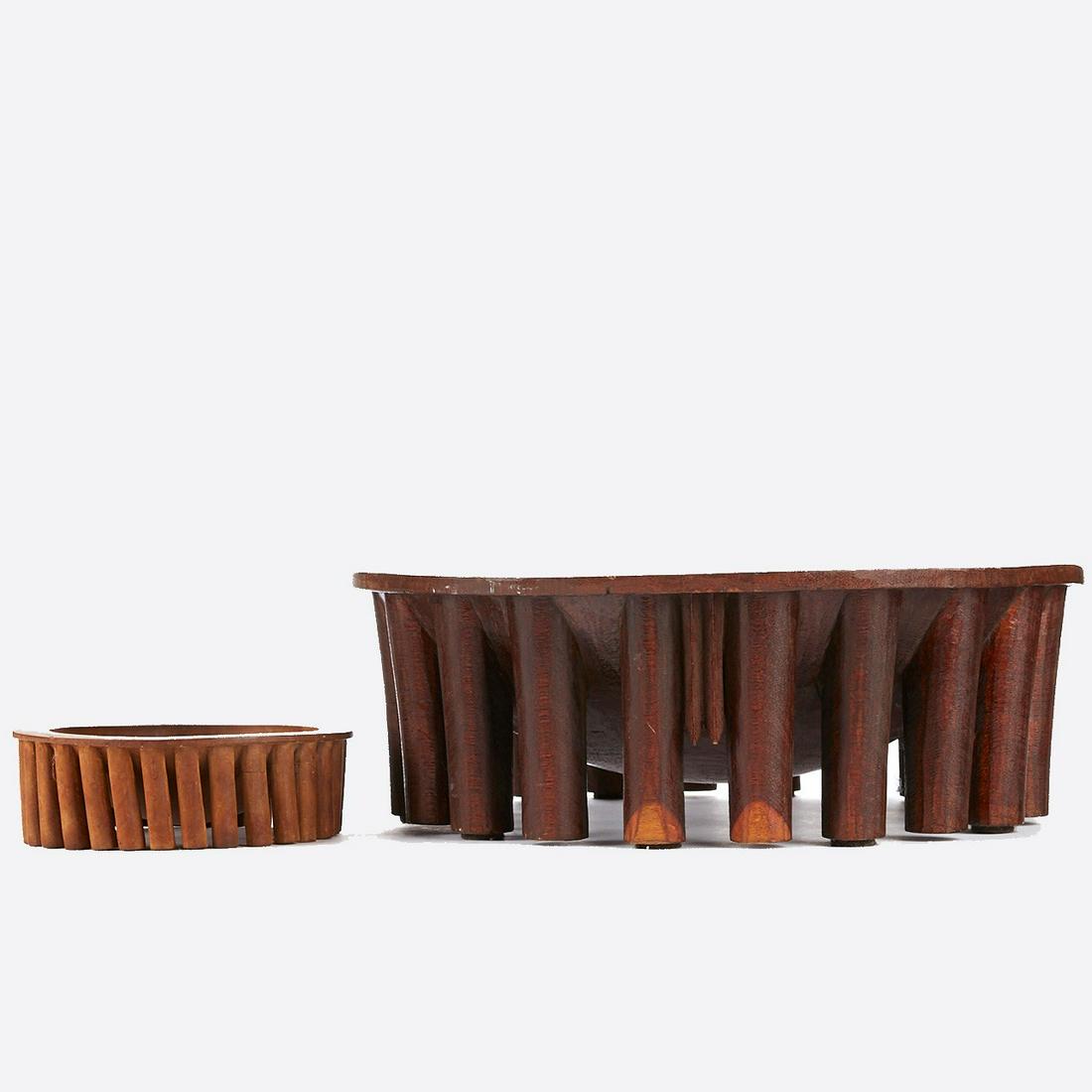 Grp: 2 20th c. Oceanic Samoan Kava Bowls: Group of two Samoan wooden Kava bowls 20th c. Great carving! The smaller bowl has 30 legs; the larger bowl has 20 legs and a lug handle. Keyword: Oceanic HawaiianLarger bowl; height: 6 1/2 in x diamet