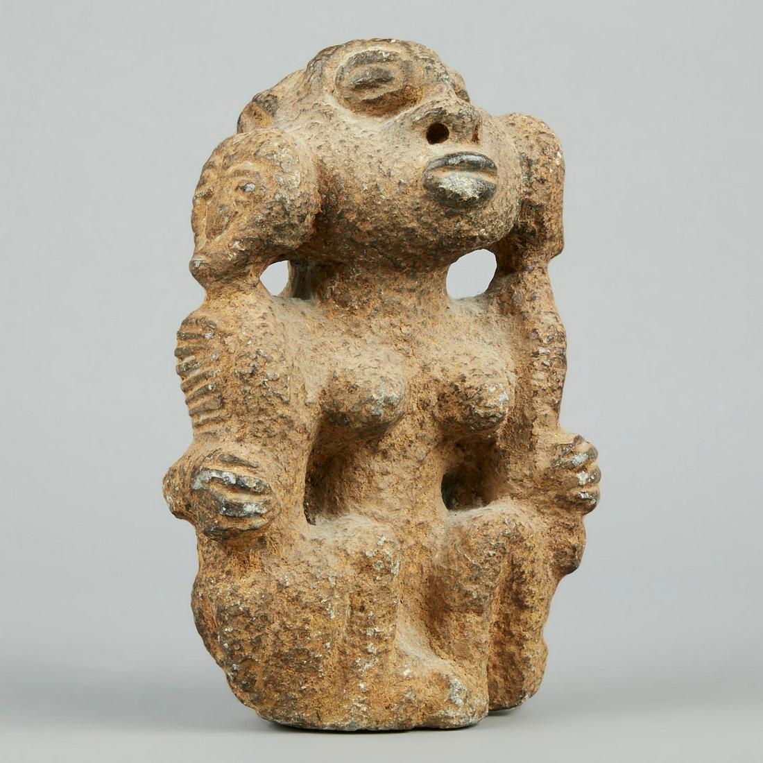 Mende African Stone Figure 19th c.: Mende (Mendi) stone figure ca. 19th c. This carved figure depicts a central female figure holding two smaller figures. The Mende who reside in Sierra Leone and Liberia are known for their carved stone