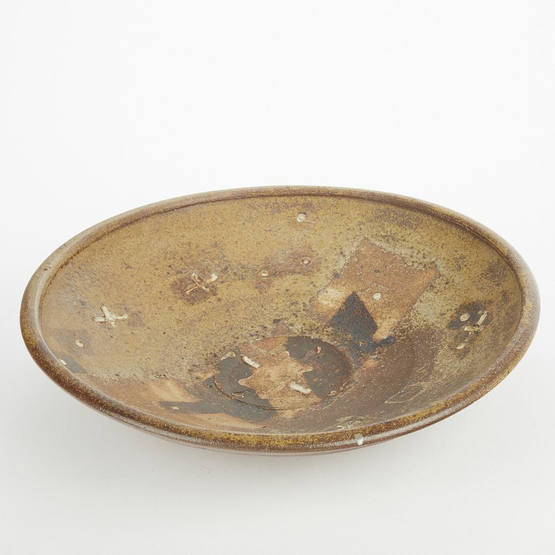 Randy Johnston Large Studio Ceramic Platter: Randy Johnston (20th/21st c). Large studio ceramic platter with an asymmetrical rim and geometric decoration along the interior. Marked along the underside.Height: 4 1/2 in x diameter: 18 1/2 in.