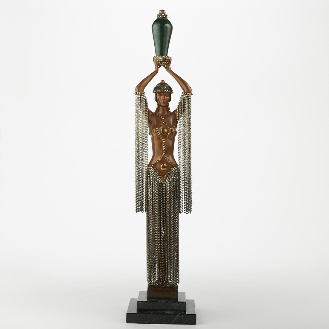 Erte Polychrome Bronze Sculpture Emerald Vase: Erte (1892-1990). Cold-painted bronze art deco sculpture depicting a woman holding a vase over her head. Signed, dated and numbered 332/375 along the base; impressed "Chalk & Vermilion & Sevenart