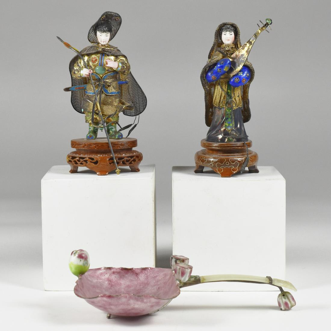 Grp: 3 20th c. Chinese Enamel & Jade Objects: Group of three 20th century Chinese enameled objects. A pair of figures depicting a male and female couple in filigree hats and capes and enameled clothing set on carved wooden stands. One ladle with 