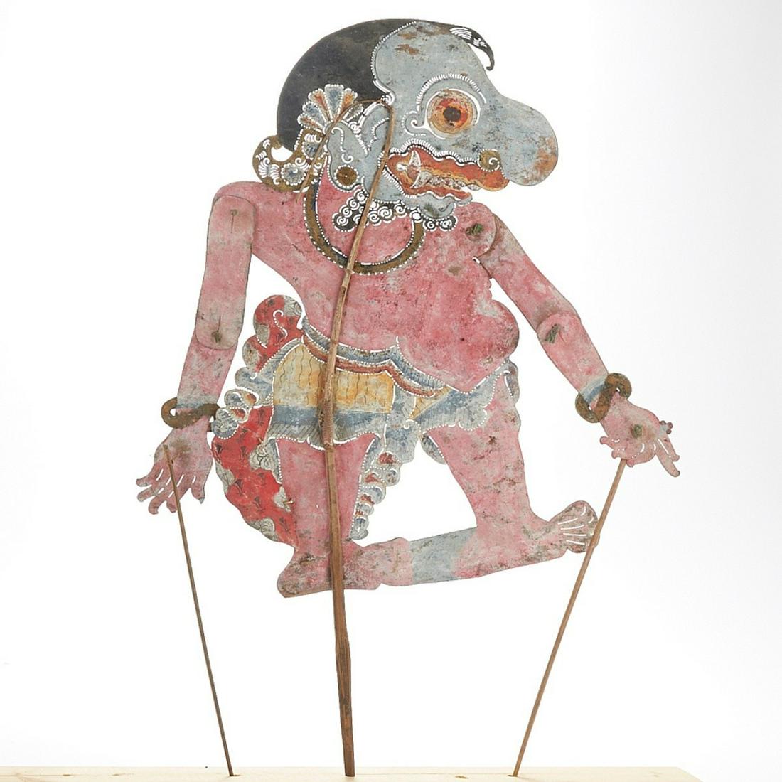 Indonesian Balinese Shadow Puppet of Human or God: Indonesian (Balinese) shadow puppet depicting a figure of a human or a god. Polychrome leather with articulated joints and wooden control rods. Keyword: Wayang kulit, Asia Height: 27 in x width: 13 in