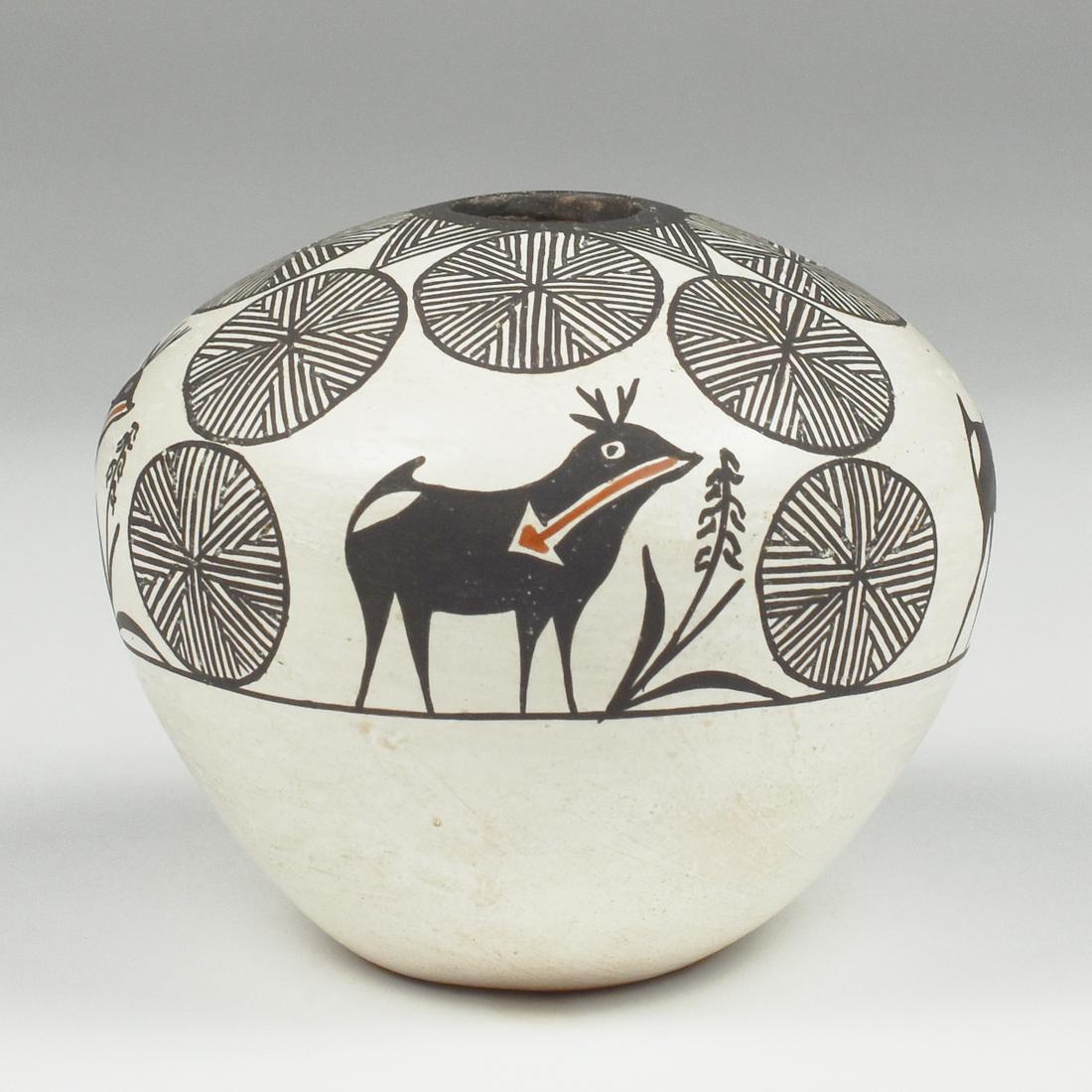 Marie and Gilbert Chino Acoma Pottery Jar: Marie Chino (1907-1982) and Gilbert H. Chino (b. 1946). Acoma Pueblo pottery seed jar, decorated with geometric and animal motifs. Signed and dated along the underside: "3-30-81, Pottery by: Mari