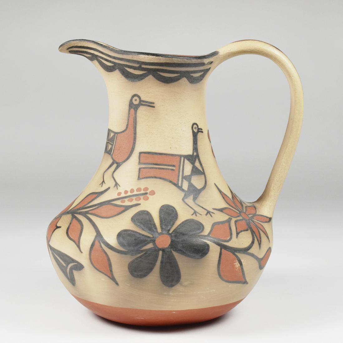 Robert Tenorio Santo Domingo Kewa Pitcher: Robert Tenorio (b. 1950). Pottery pitcher, decorated in black and red with bird and floral motifs. Incised signature under the base; additionally inscribed "Santo Domingo Pueblo, N.M."Height