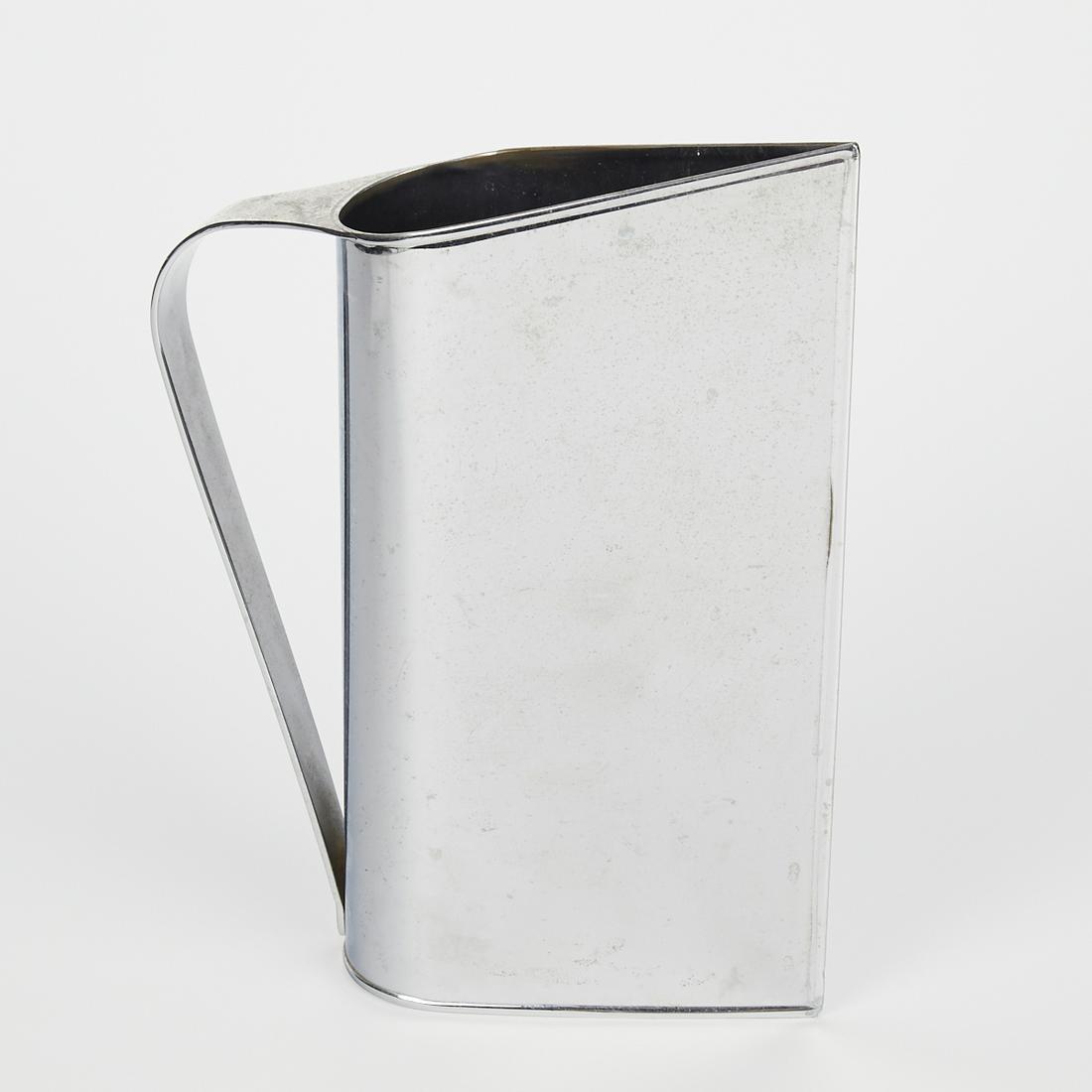 Peter Muller-Munk for Revere Normandie Pitcher: Peter Muller Munk (1904-1967) for Revere Copper and Brass, Inc., United States. Normandie pitcher, designed 1935. Chromed copper with a single sheet construction. Height: 12 in x width: 10 in x depth: