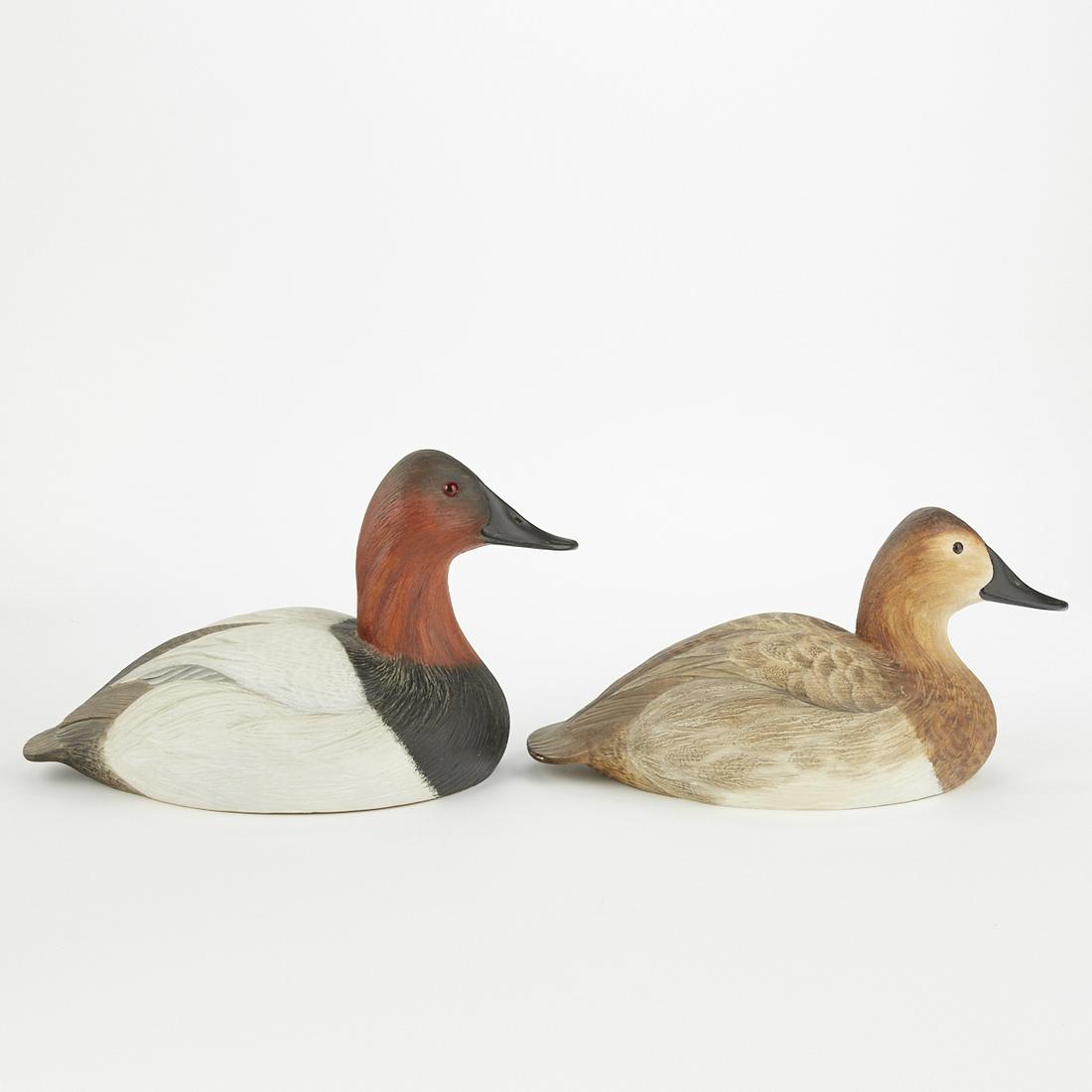 Pair of Robert Kerr Wood Duck Decoys: Robert G. Kerr (b. 1935). Pair of carved and painted wood duck decoys. Marked "Smiths Falls Ontario" and pencil signed and dated "Oct. 1972 R. G. Kerr" along the underside. Red Duc